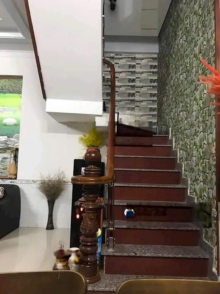 Nhà 1 trệt 1 lầu chợ Dĩ An 1 ngang 6m đường thông giá rẻ