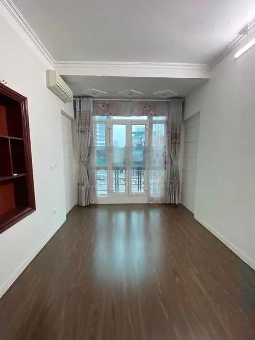 BÁN NHÀ MẶT PHỐ VŨ HỮU - KINH DOANH - GARA OTO- 5T - 7 PHÒNG-SỔ ĐẸP - 13.5 TỶ