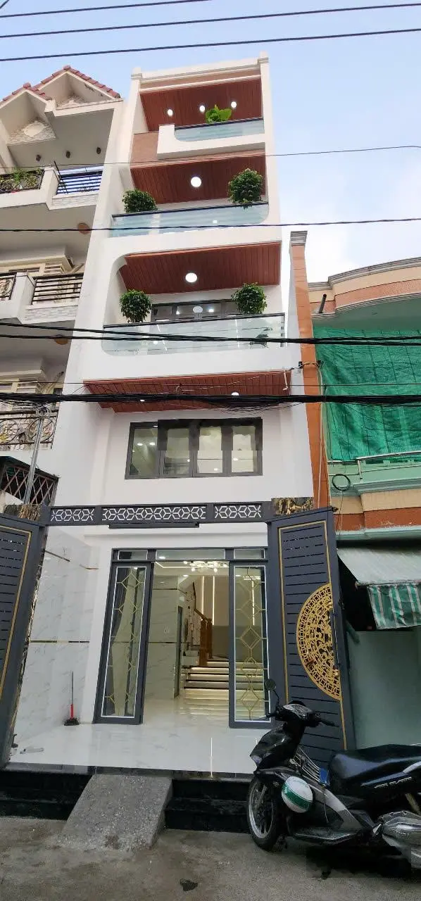 Siêu hot nhà đẹp 4x14m, 3 lầu + sân thượng 2 sẹc mã lò, đường 8m