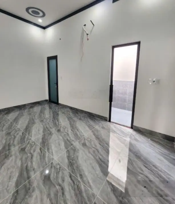 Chính chủ bán nhà 1 trệt 1 lầu sân oto 81m2 sổ riêng ngay KDC Triệu Hoàng Long TP. Thuận An