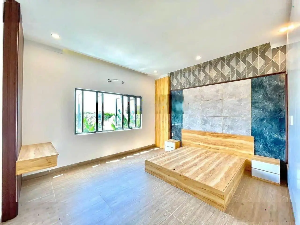 Cần bán căn nhà ở gần chợ Bình Chánh nằm ngay đường Hoàng Phan Thái DT 90m2 SHR không quy hoạch