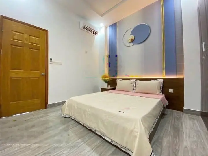 Hẻm nhựa ôtô - nhà 3 tầng DT: 100m2 - trệt 2 lầu, 5PN, 4WC sổ hồng, Thị trấn Nhà Bè