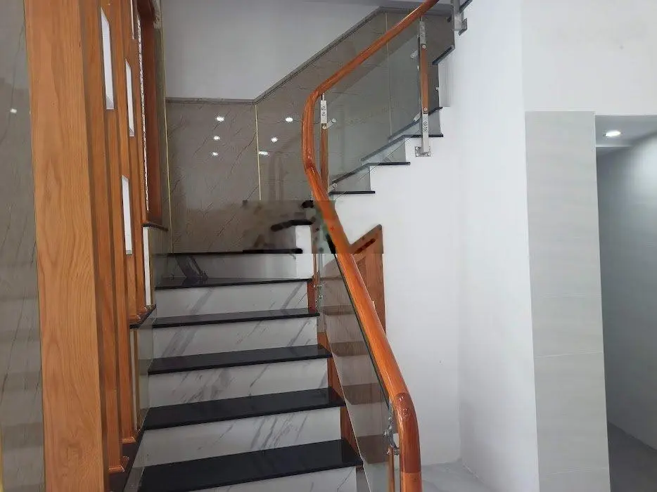 Bán nhà riêng 1 trệt 1 lầu đang hoàn thiện DT 69 m2 DTSD 140 m2 SHR thổ cư 100% hoàn công đầy đủ