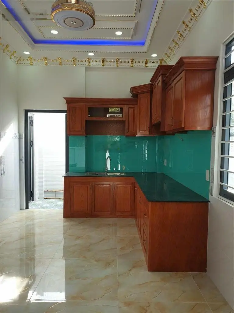 Bán nhà 1 lầu góc 2MT DT: 10 x 18m gần ngã 3 Ô Trác, Chợ Tân Hiệp