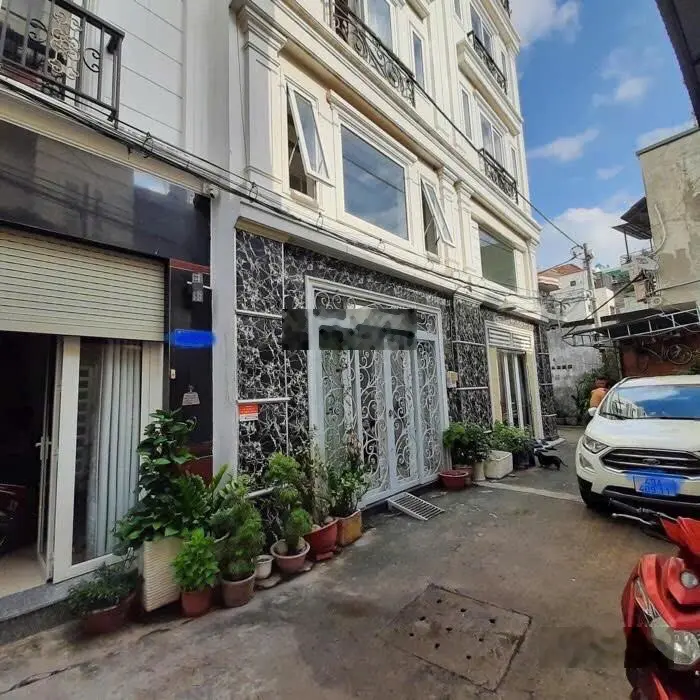 Nhà đẹp , bình thạnh 47m2 ( 4* 11,7) , 4 tầng _ hẻm xe hơi _ giá 7,2 tỷ _ gần trung tâm bà chiểu