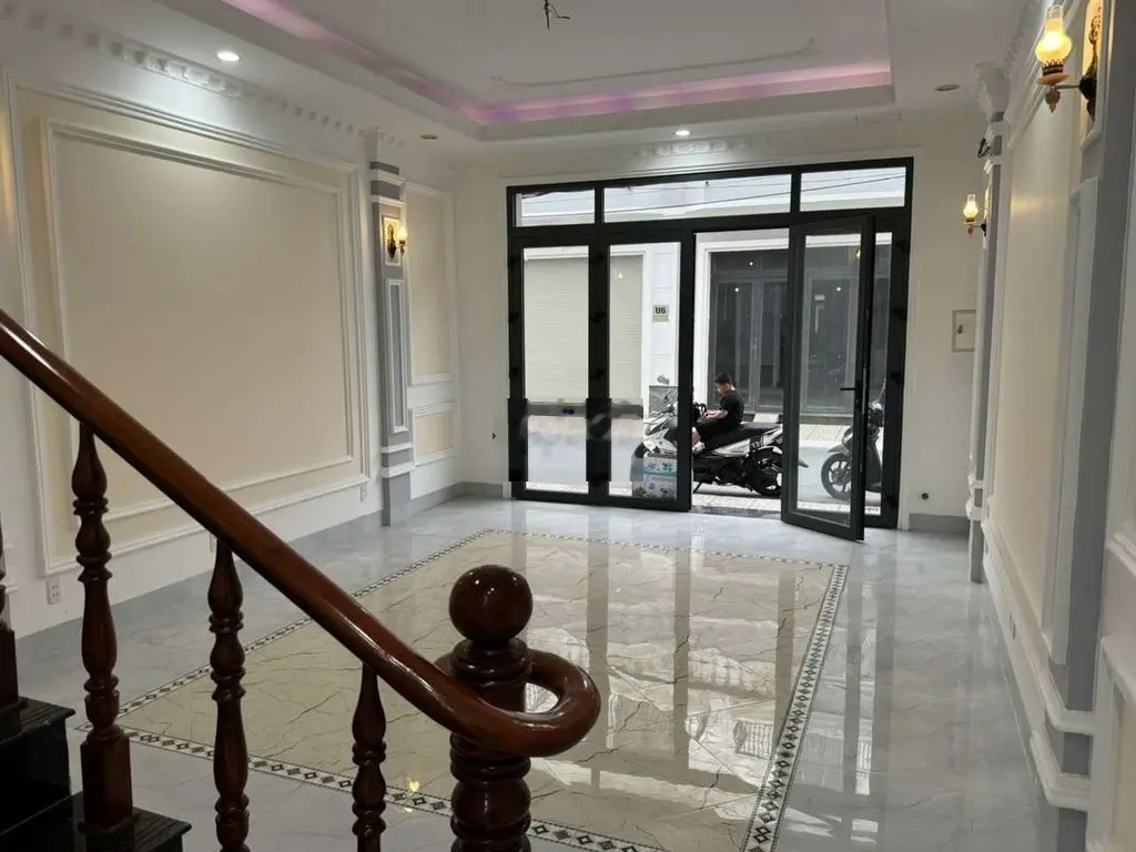 NHÀ 1TRỆT 2 LẦU KHUNGỌC LAN,P8-TP VĨNH LONG