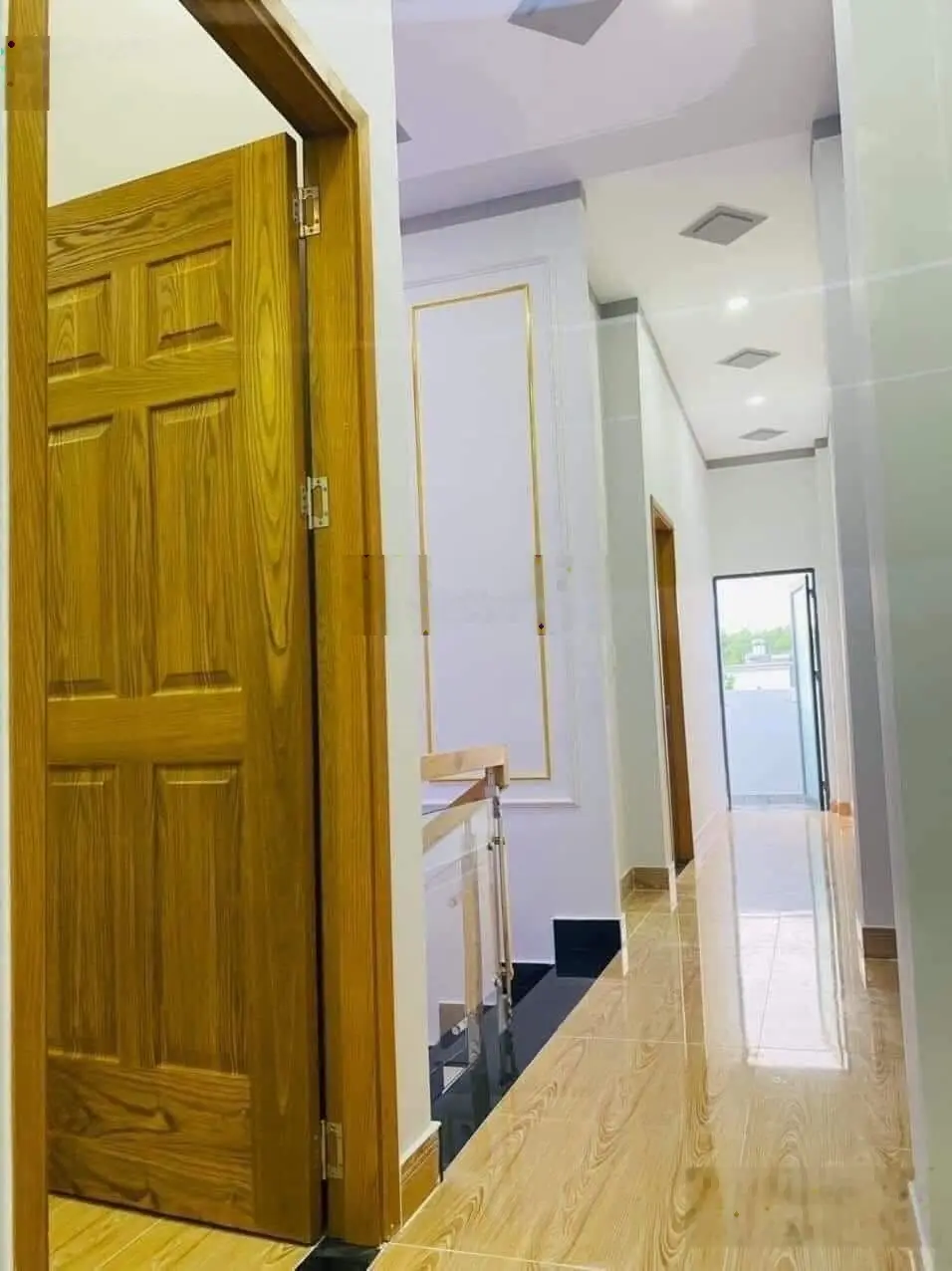 Bán nhà mới 2lầu 100m2 sổ riêng đường lớn ngay chân cầu Hoá An