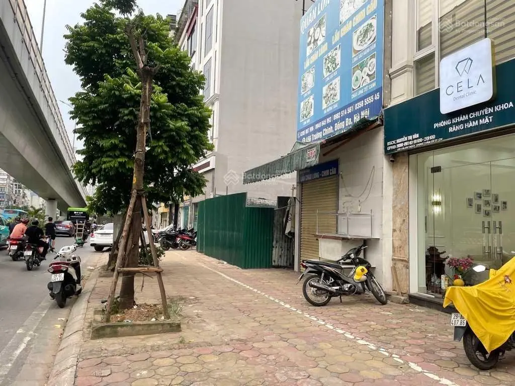 Nhà đất lô góc, tặng nhà 2 tầng + GPXD + bản TK 6 tầng mặt phố Trường Chinh, 31,3m2, giá 16,9 tỷ