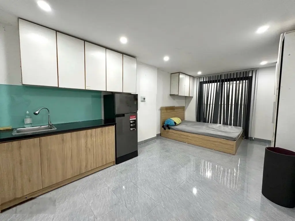Nhà 5 tầng 14 CHDV ngay Lê Quang Định doanh thu 750tr/năm hẻm xe hơi chỉ 15 tỷ TL