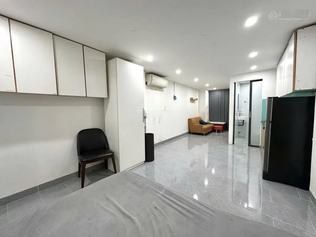 Nhà 5 tầng 14 CHDV ngay Lê Quang Định doanh thu 750tr/năm hẻm xe hơi chỉ 15 tỷ TL