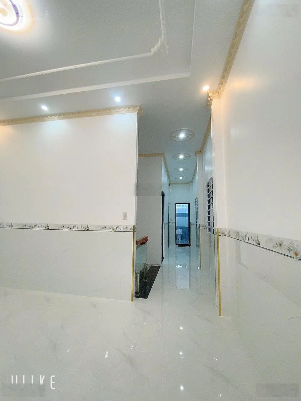 Bán nhà lầu mới 100% sổ hoàn công nhà 3 p ngủ vị trí góc 2 mặt tiền lộ oto đậu trước nhà