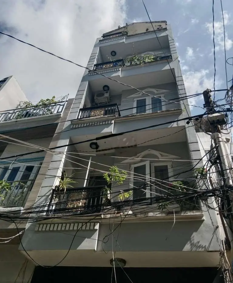 NHÀ 4 LẦU MẶT TIỀN ĐƯỜNG SỐ CHỢ TÂN MỸ Q7