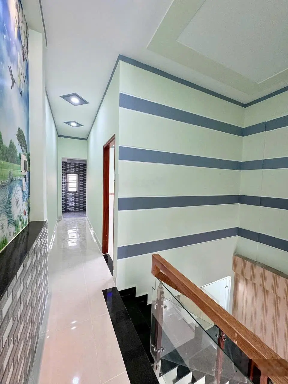 Chủ gởi bán nhà (hoàn công) 1 trệt 1 lầu. dt 60m2 sổ riêng thổ cư 100% đường xe hơi tại p. bửu hòa