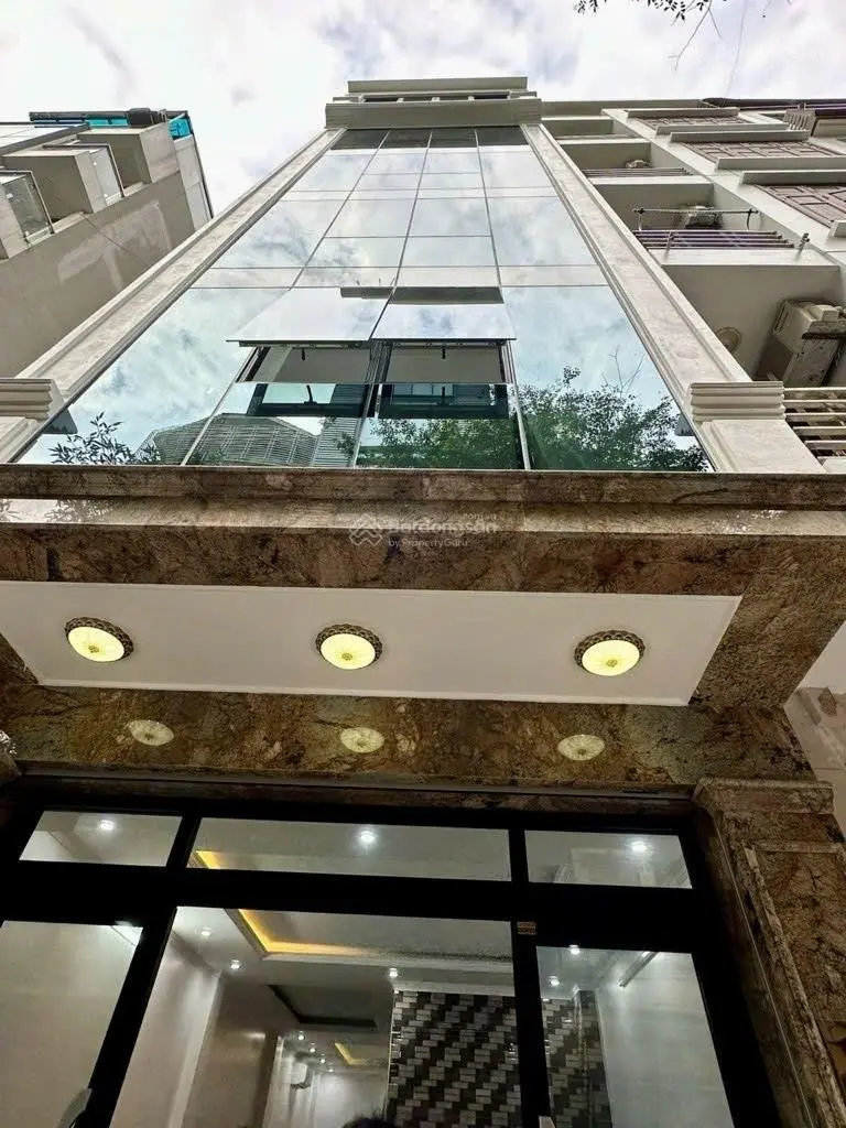 Tòa nhà VP phố Dương Khuê 60m2 x7 tầng thang máy x 25.5 tỷ - SĐCC - gara ôtô - kinh doanh sầm uất