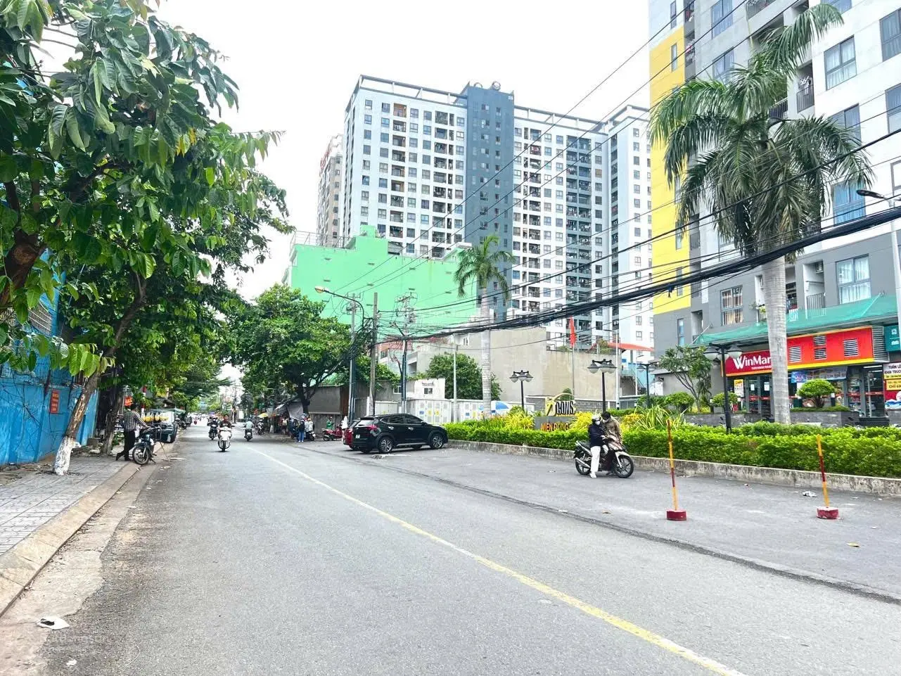 Đất 390m2 ngang 16m mặt tiền đường nhựa chính ngay cổng chung cư giáp làng đại học