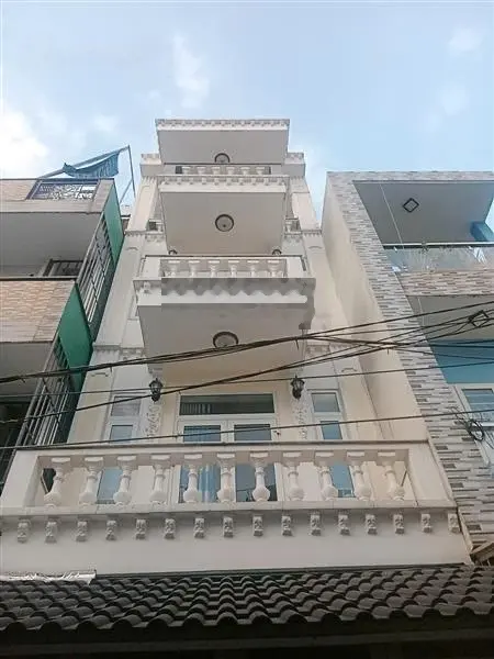 Gần cv làng hoa-hxh vào nhà-2 căn ra mt-nhà đẹp ở ngay-72m2-4tầng-4pn-5wc-lê văn thọ p9 gv-7tỷ8 tl