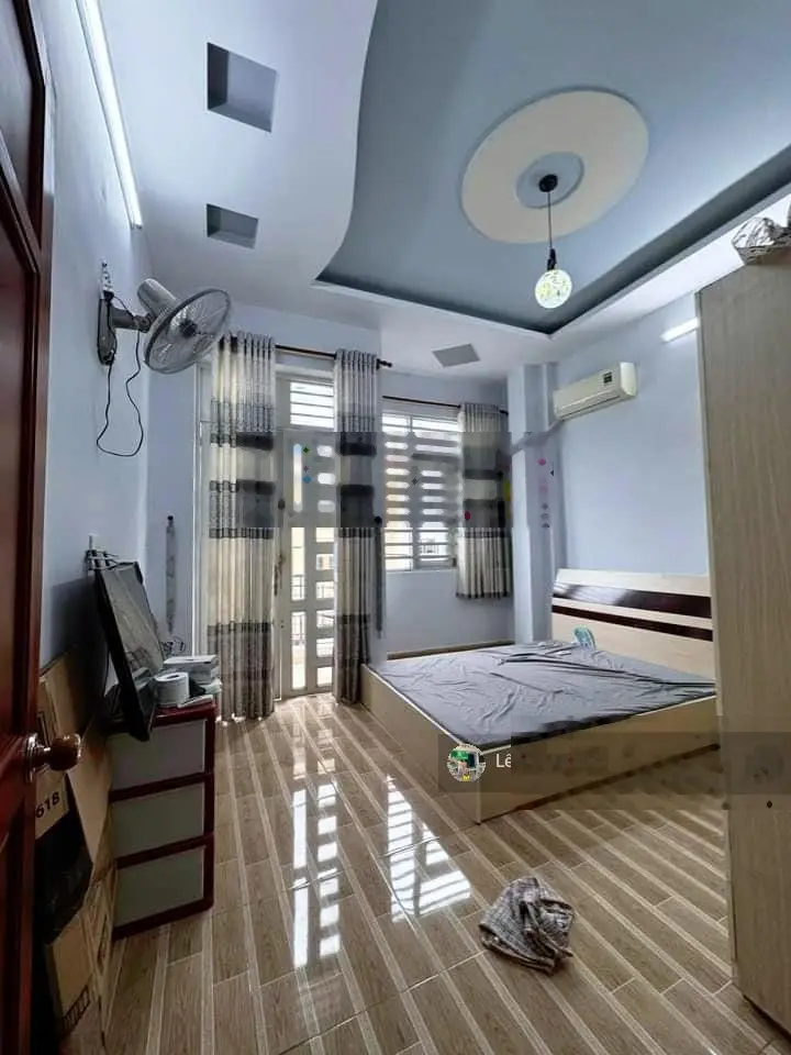 Nhà hẻm xe hơi - Quang Trung Phường 11 - nhà 4 tầng gần chợ Hạnh Thông Tây