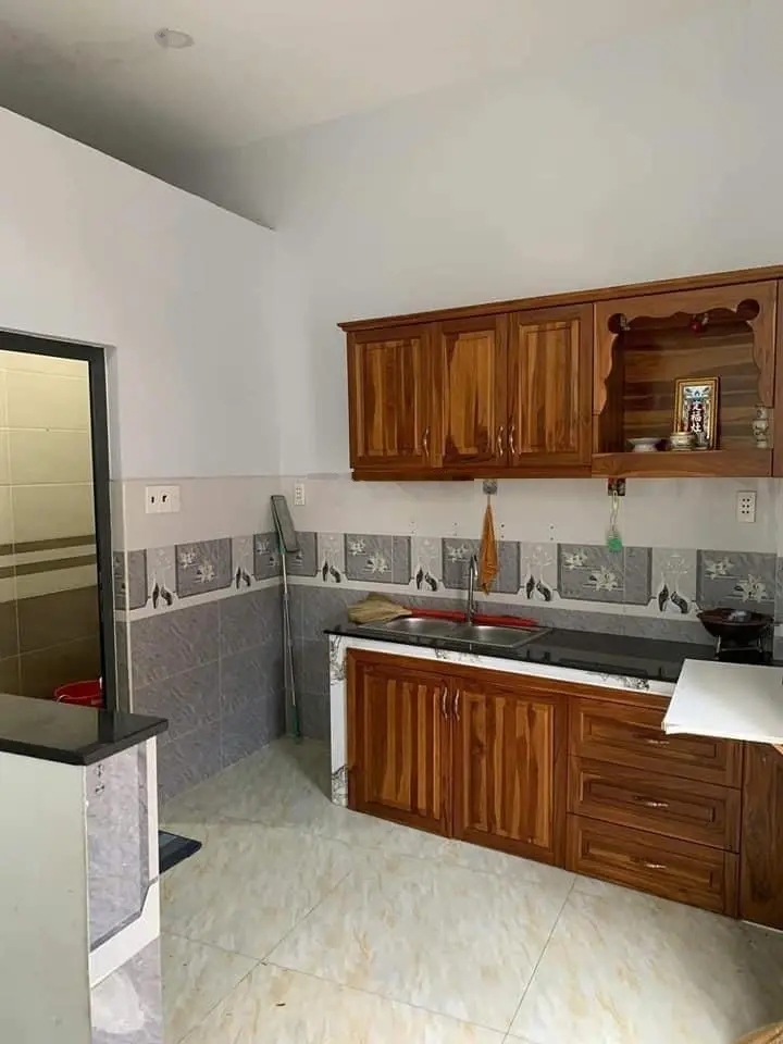 Nhà mới sửa lại 1T2L bán gấp đường Hồ Bá Kiện 48,7m2 gần chợ sỉ thuốc, sổ sẵn