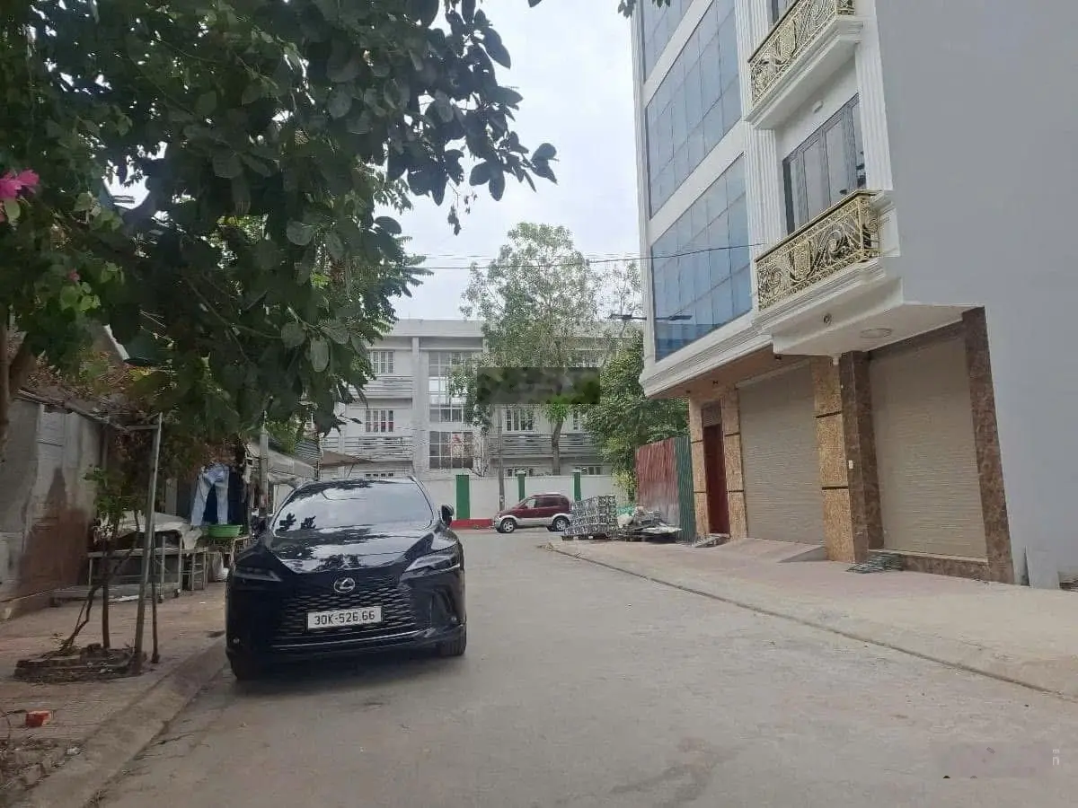 Bán nhà phân lô ô tô tránh phố trạm long biên 63mx6tầng mt 6m gara 2 ô tô kinh doanh giá 22tỷ