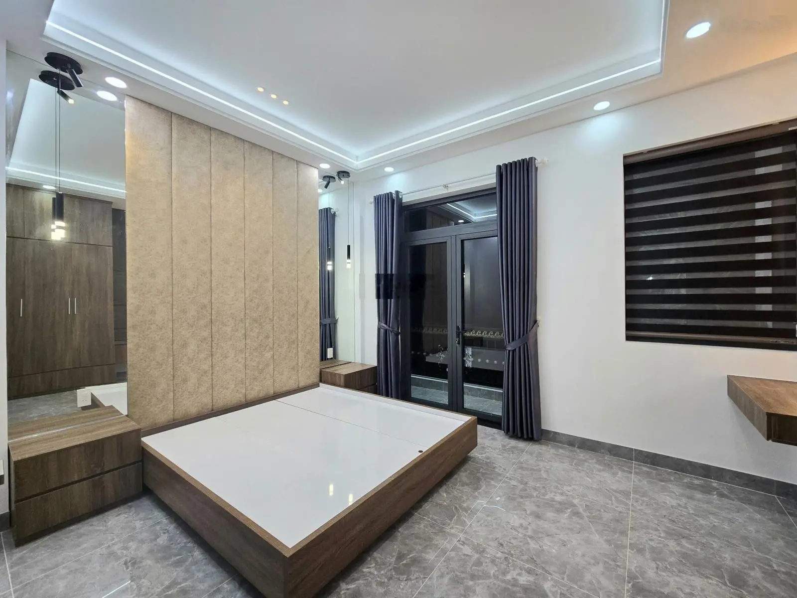 Bán nhà đường An Phú Đông 12 - 1 trệt 1 lửng 2 lầu - 4PN 5WC full nội thất - xe hơi ngủ trong nhà