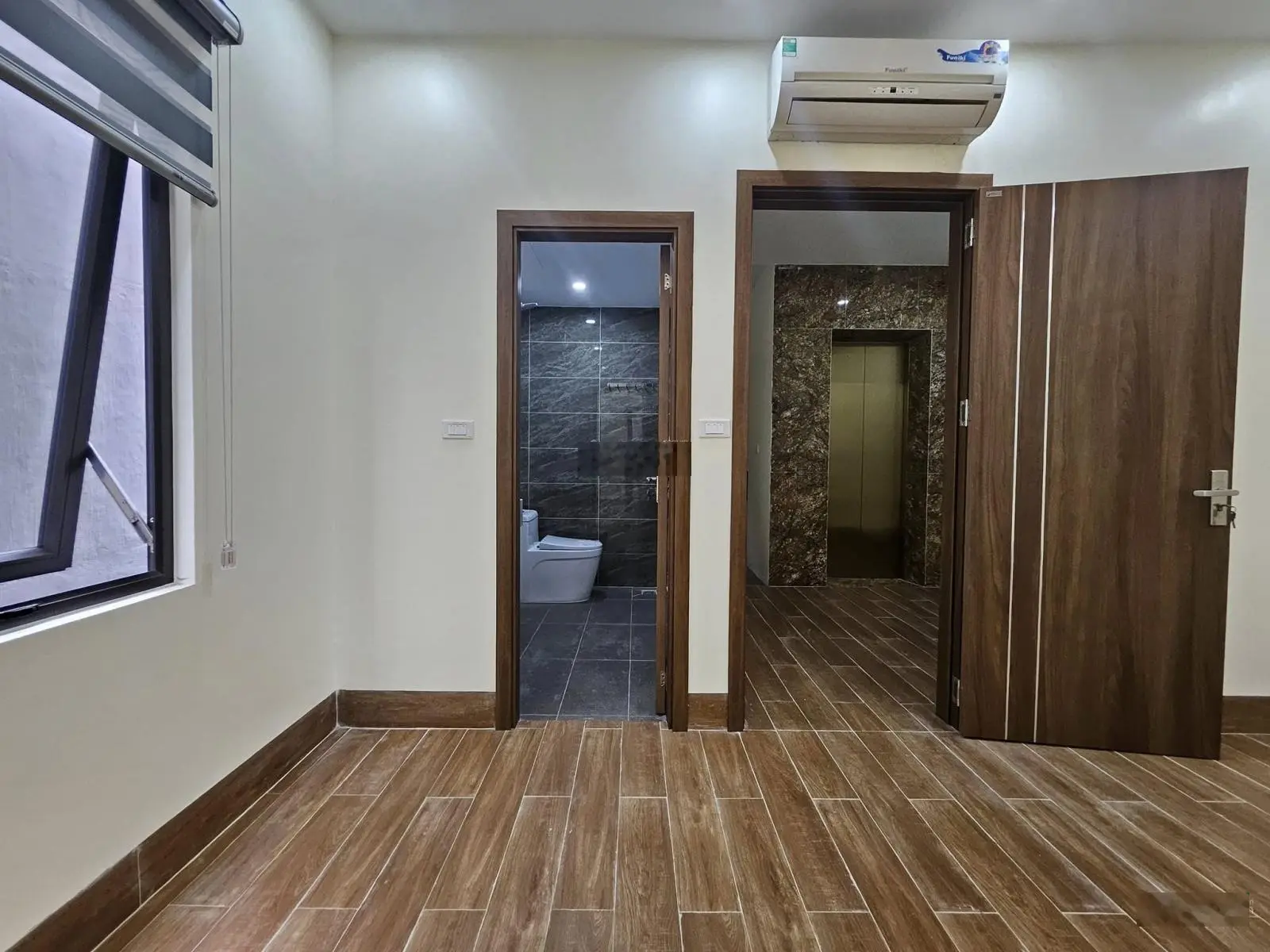 Tôi bán nhà Trần Nguyên Đán thang máy oto tránh DT 75m2 6T nhỉnh 15 tỷ