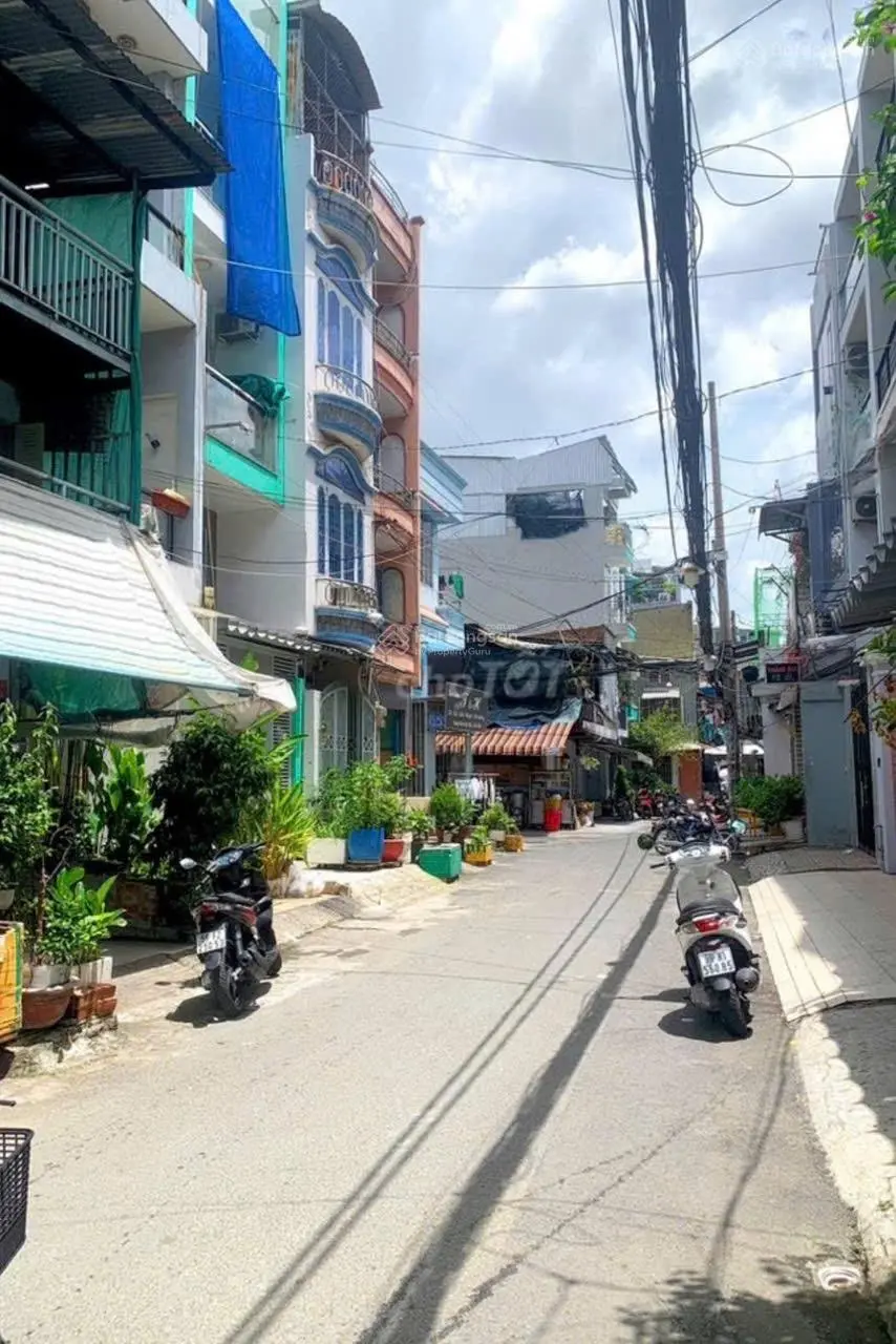 Bán nhà MTNB Lê Thị Bạch Cát 4* 11 trệt lửng 2 lầu sân thượng giá 10 tỷ5 hoàn công đủ có thang máy