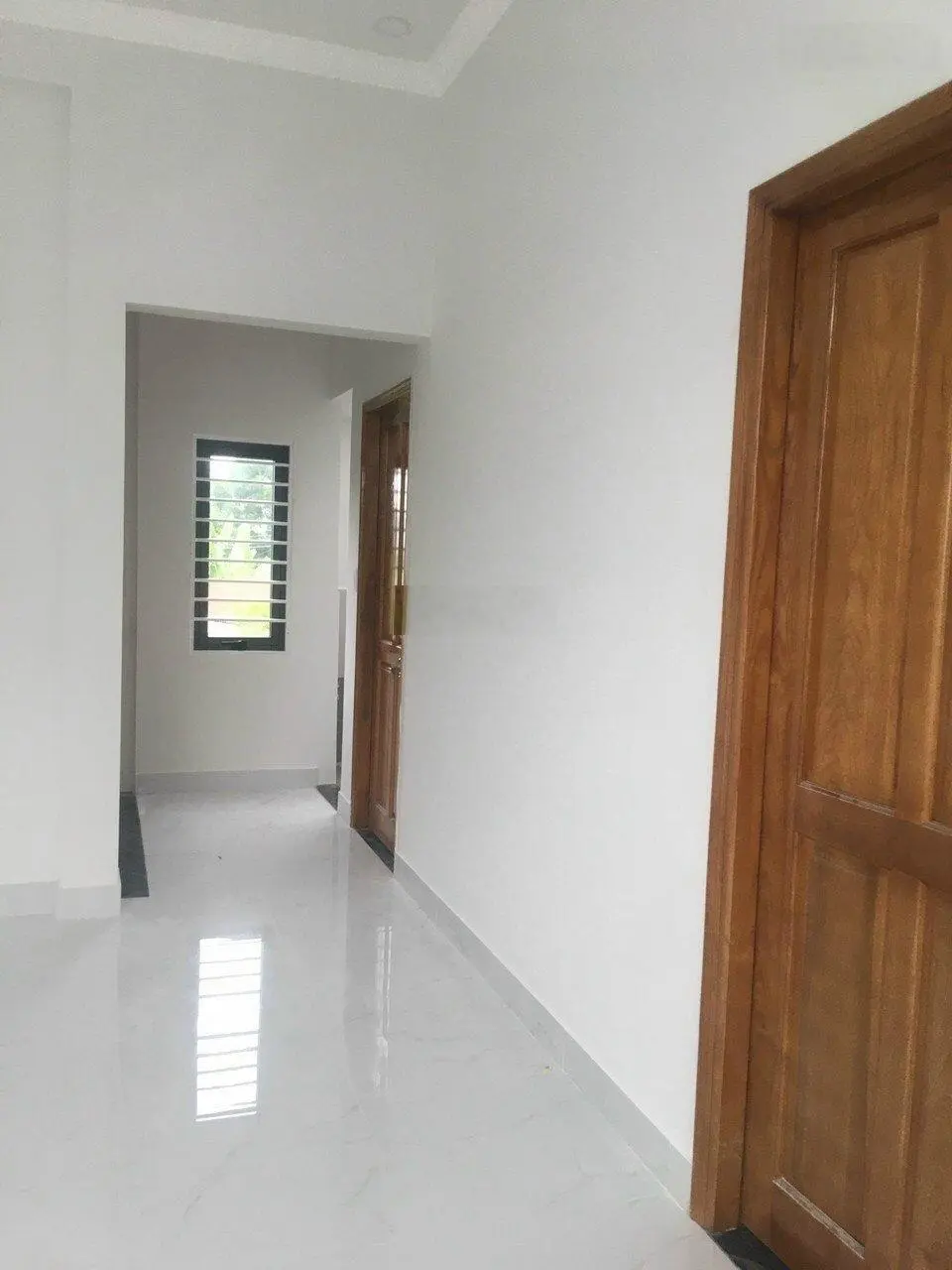Bán nhà riêng 1 trệt 1 lầu đang hoàn thiện DT 69 m2 DTSD 140 m2 SHR thổ cư 100% hoàn công đầy đủ