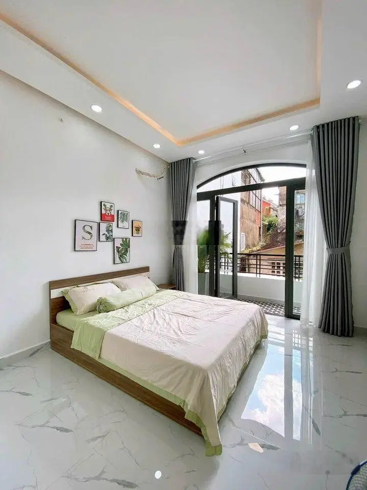 Cần bán gấp nhà Quận 12 giáp Gò Vấp, hẻm ô tô quay đầu, giá 2,6 tỷ (2 lầu + 3PN, nhà mới)