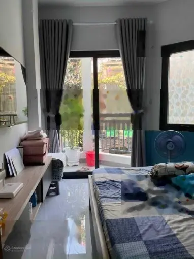 Bán nhà riêng tại đường Phạm Văn Hai, 64m2, ngay Tân Bình. Sổ hồng riêng. Dân cư đông