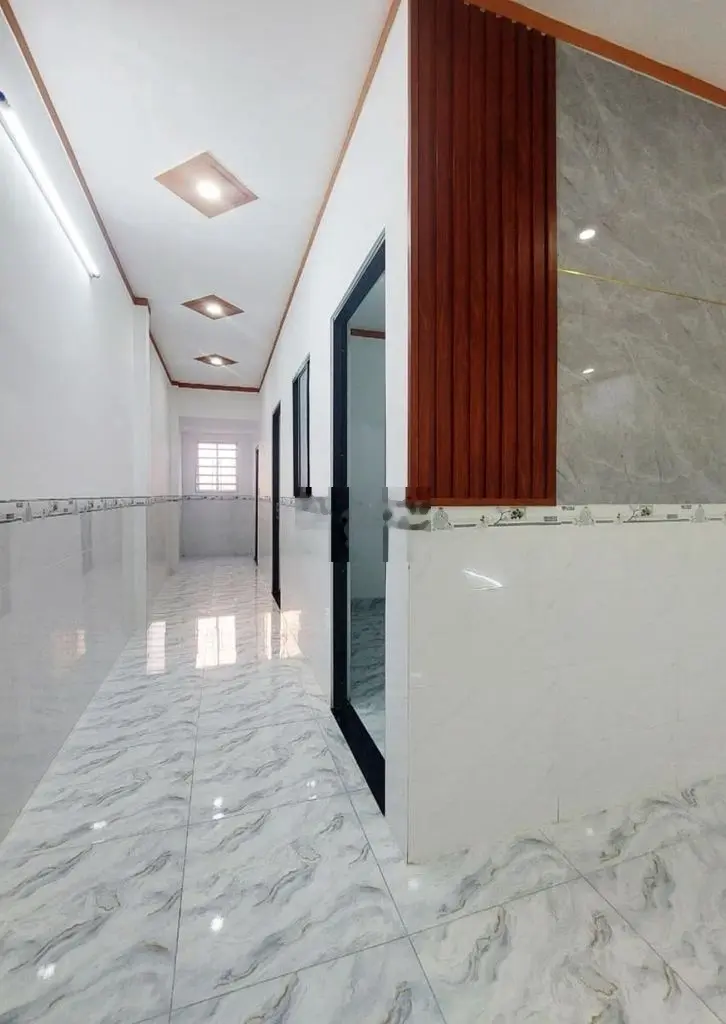 Nhà 1 trệt 1 lửng gần thị trấn Củ Chi 560 tr/120m2 sổ riêng