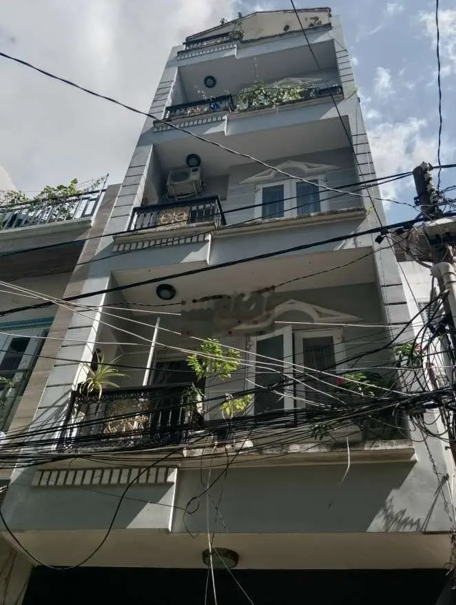 NHÀ 4 LẦU MẶT TIỀN ĐƯỜNG SỐ CHỢ TÂN MỸ Q7