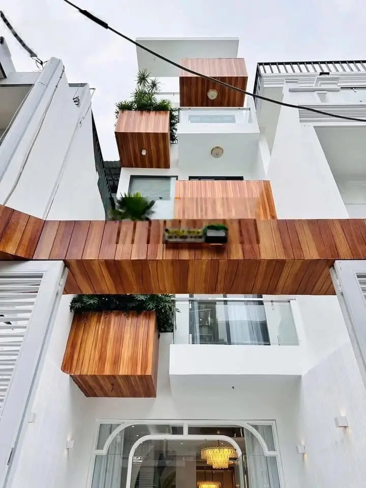 Bán nhà HXH 7m thông 276/113 Thống Nhất P16 ngay Lotter Mart 4 tầng 4PN 5WC 4x15.3m có thang máy