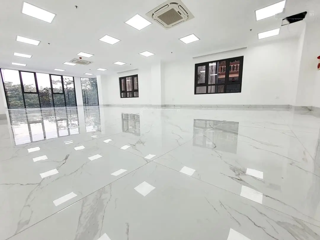 Bán nhà Phạm Tuấn Tài, Cầu Giấy 63m2, gara oto 7 chỗ, văn phòng, 8 tầng 21 tỷ
