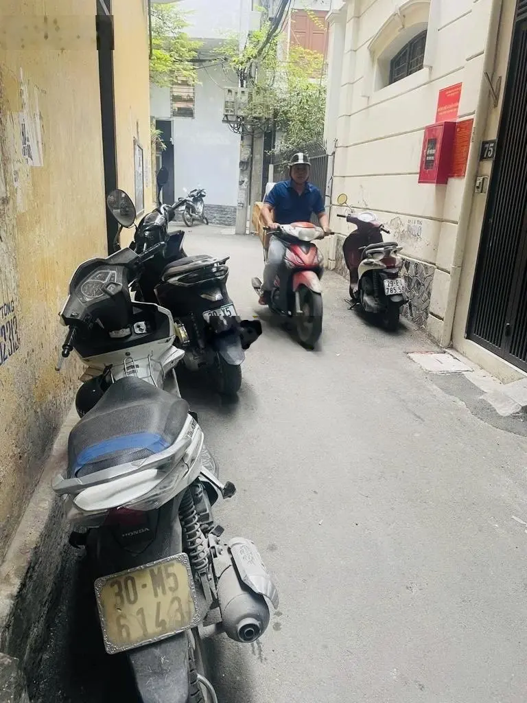 Bán nhà 7 tầng Thái Hà, dòng tiền cao 75 triệu/th, 2 mặt ngõ, gần phố, thang máy, giá 14.5 tỷ