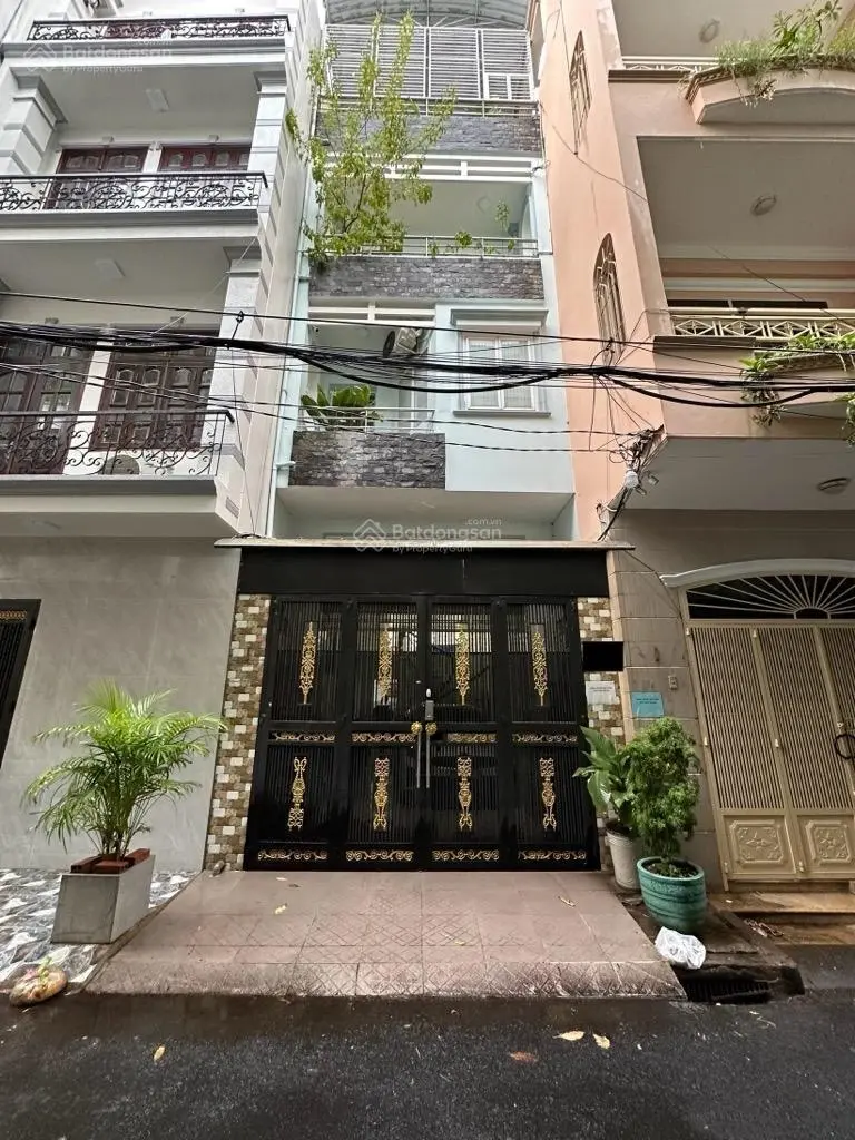 Nhà bán hẻm xe hơi ngủ trong nhà , thông, 4 tầng 4m x 15m(60m2) Tân bình, giá 12ty