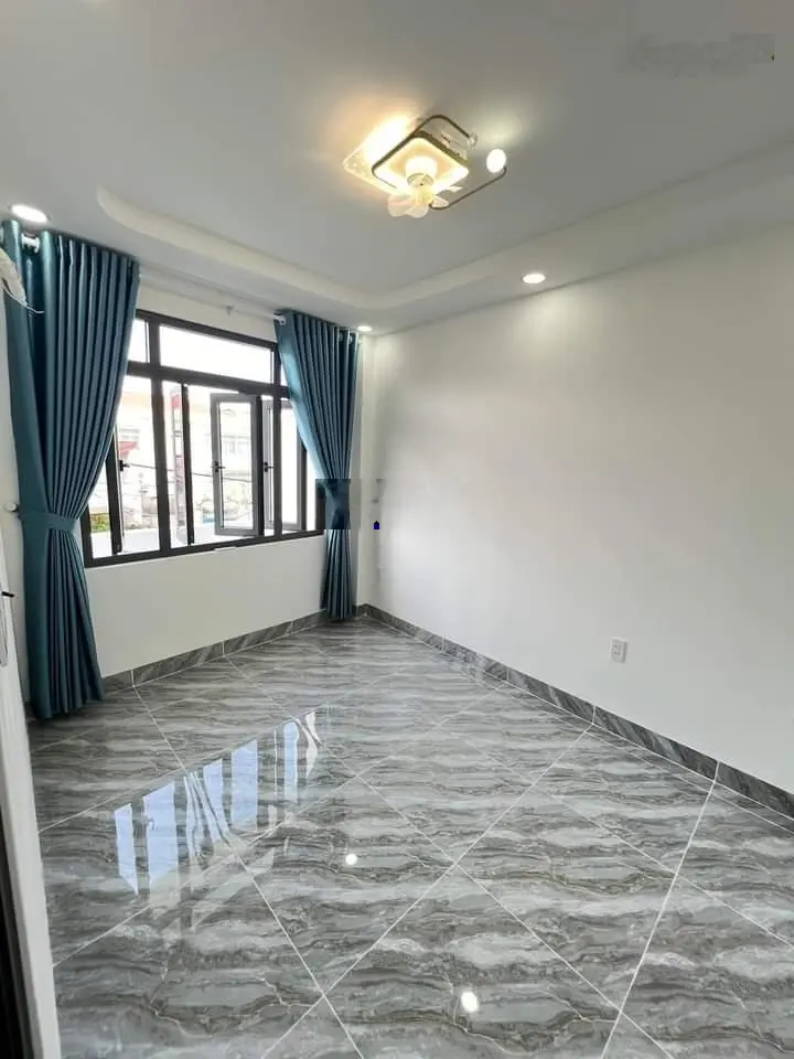 Nhà 1 trệt 1 lầu 99m gần Chợ - Trung Tâm Hành Chính huyện nhà thuộc Thị Trấn Hóc Môn