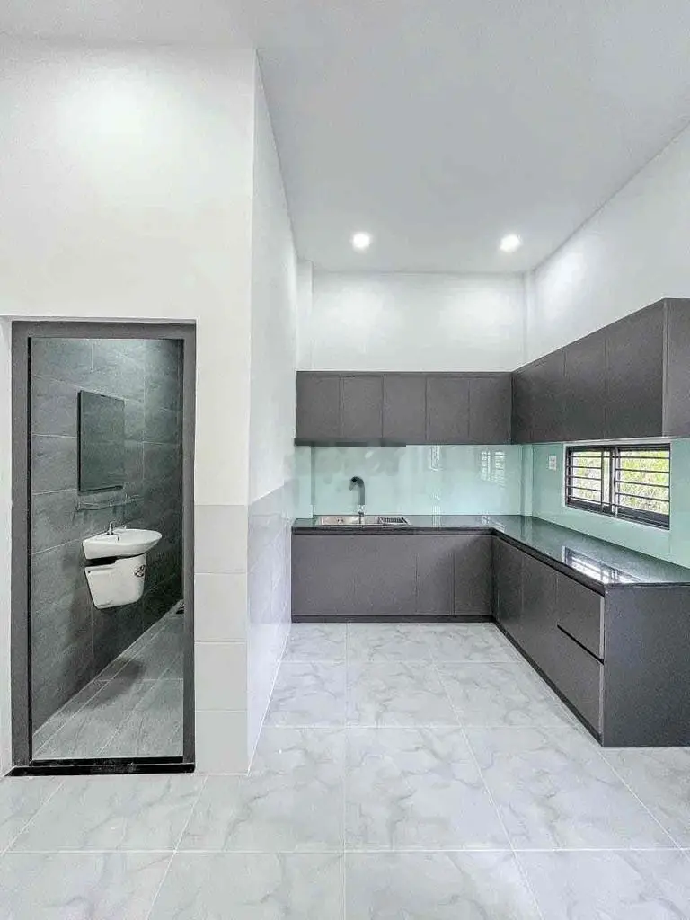 Nhà giá rẻ 1trệt 1 lầu 6.4x15.5 98.8m2/ 1,2T P. An Phú Thuận An
