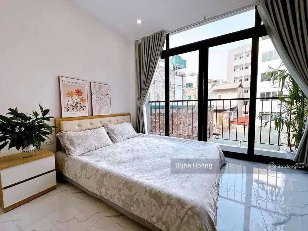 Bán nhà tư đình 43m* 6 tầng - thang máy - ô tô 7 chỗ vào nhà - ngõ thông - giá chỉ 8.5 tỷ