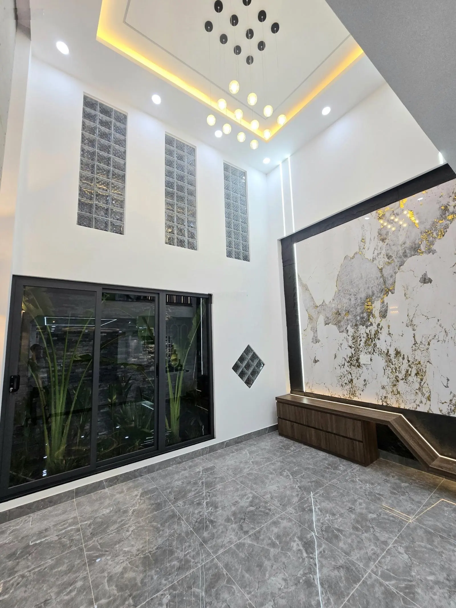Bán nhà đường An Phú Đông 12 - 1 trệt 1 lửng 2 lầu - 4PN 5WC full nội thất - xe hơi ngủ trong nhà
