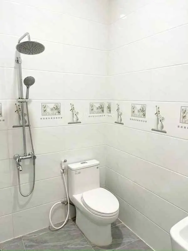 Bán nhà 1 trệt 1 lầu, 90m2, phố Bà Triệu, Thị Trấn Hóc Môn, huyện Hóc Môn, sổ hồng riêng GIÁ 2 TỶ 7