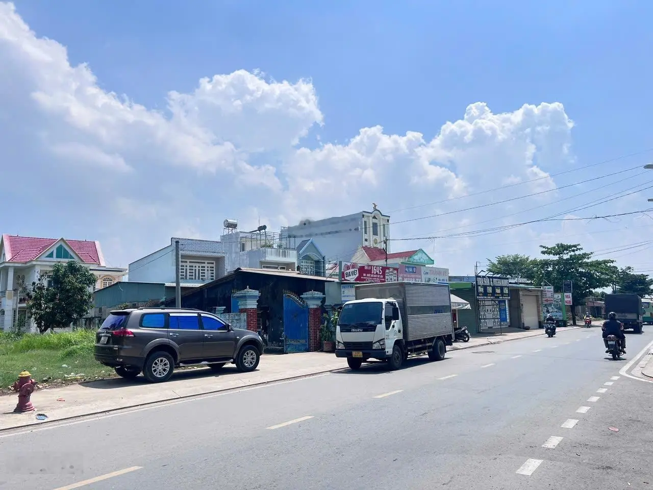 Bán nhà đất MT đường Nguyễn Duy Trinh, Long Trường Q9. DT: 16x30 nở hậu CN 590m2, 2 tầng giá 30 tỷ
