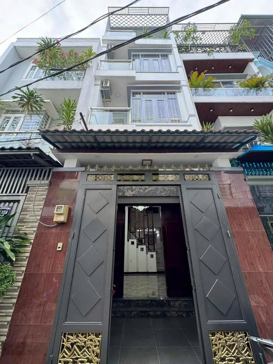Định cư bán gấp căn nhà đường Nguyễn Phúc Chu, P. 15, Quận Tân Bình. Hẻm lớn 6m ô tô
