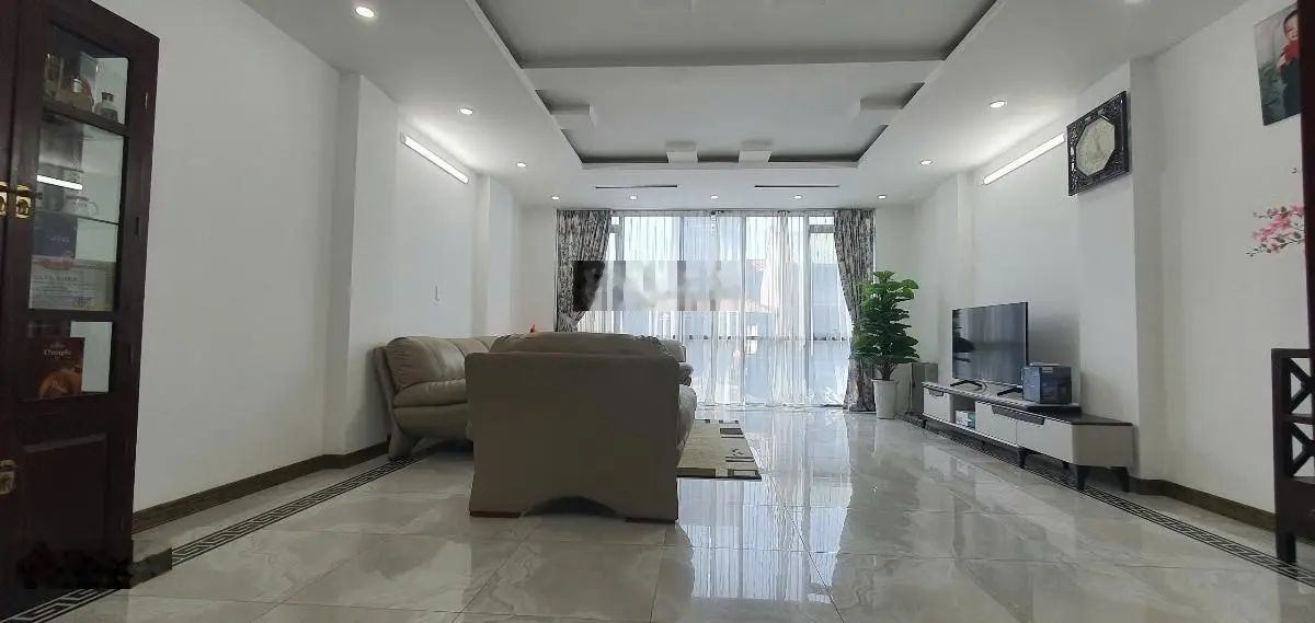 Bán nhà mặt hồ Chùa Láng - Đống Đa 64m2 xây 5 tầng thang máy 2 mặt ngõ 33 tỷ có TL