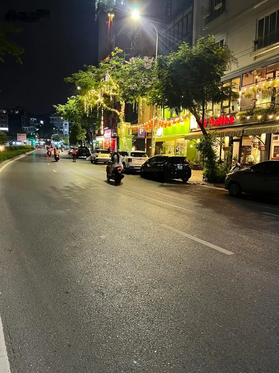 Bán Nhà 7T, thang máy, mặt hồ, Phố Mai Anh Tuấn, Đống Đa. KD cafe, lô góc.DT 51m2xMT 9m.Giá:27 tỷ.