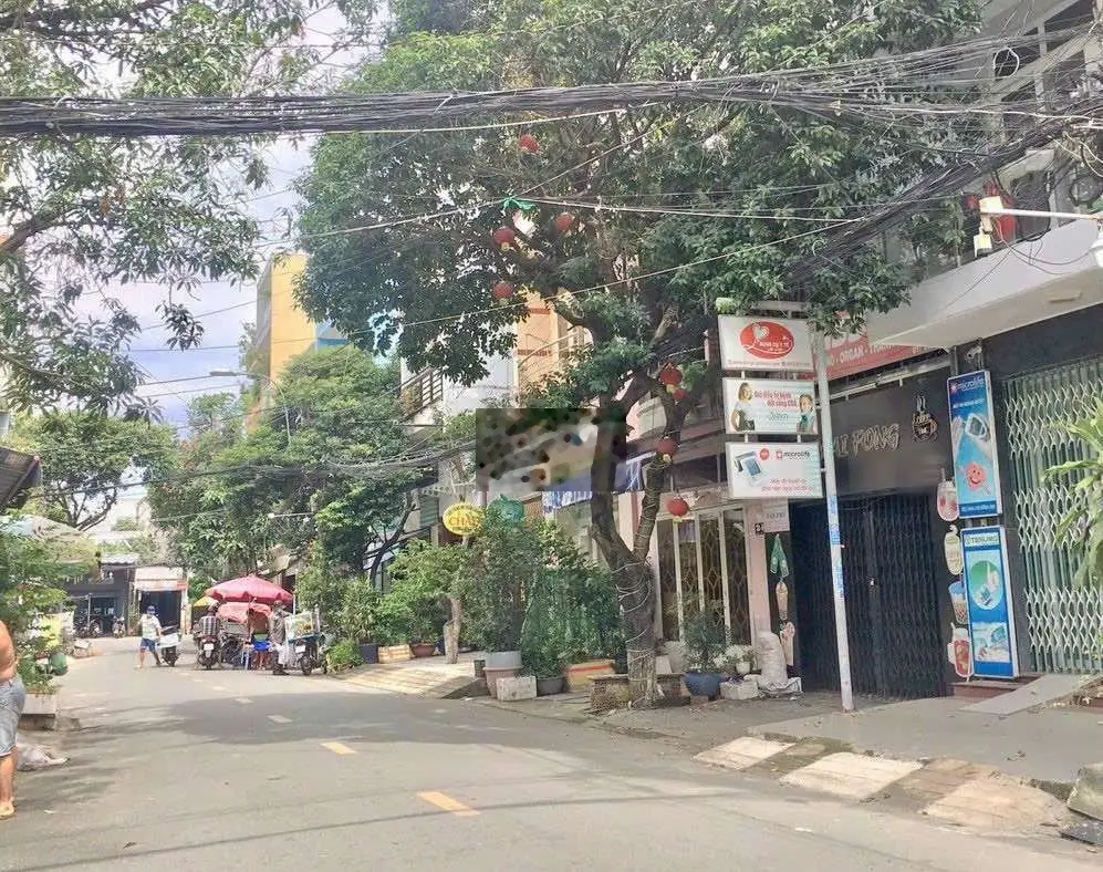 NHÀ 4 LẦU MẶT TIỀN ĐƯỜNG SỐ CHỢ TÂN MỸ Q7