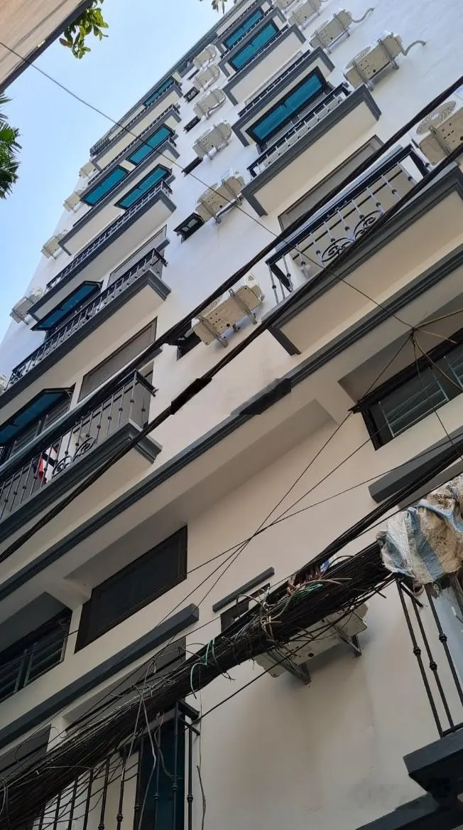 Siêu phẩm! Tòa CCMN 100m2*9T trục ngõ thông 1 nhà ra ô tô tránh, đối diện ĐH GTVT Triều Khúc HN
