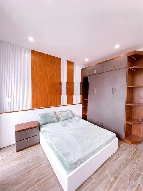 Bán nhà mặt tiền sau lưng chợ Bình Chánh, gần QL1A, DT 70m2, hẻm 5m, 1T2L SHR