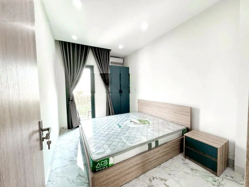 Bán toà căn hộ 5 tầng đường Lê Văn Tâm, gồm 15 phòng, dòng tiền 50tr/th, DT đất 90m2 - giá 8 tỷ8 TL