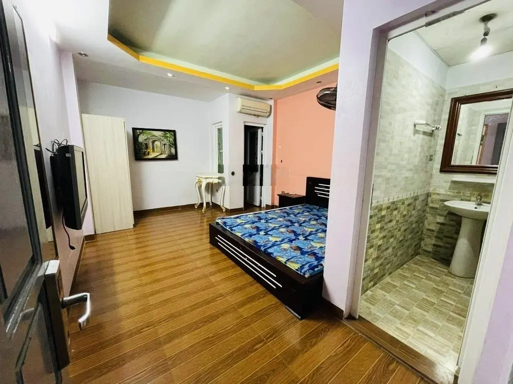 Bán CCMN 9 tầng Nguyễn Chí Thanh, 15 phòng, thang máy, 2 mặt ngõ, ô tô đỗ cửa, kinh doanh tốt