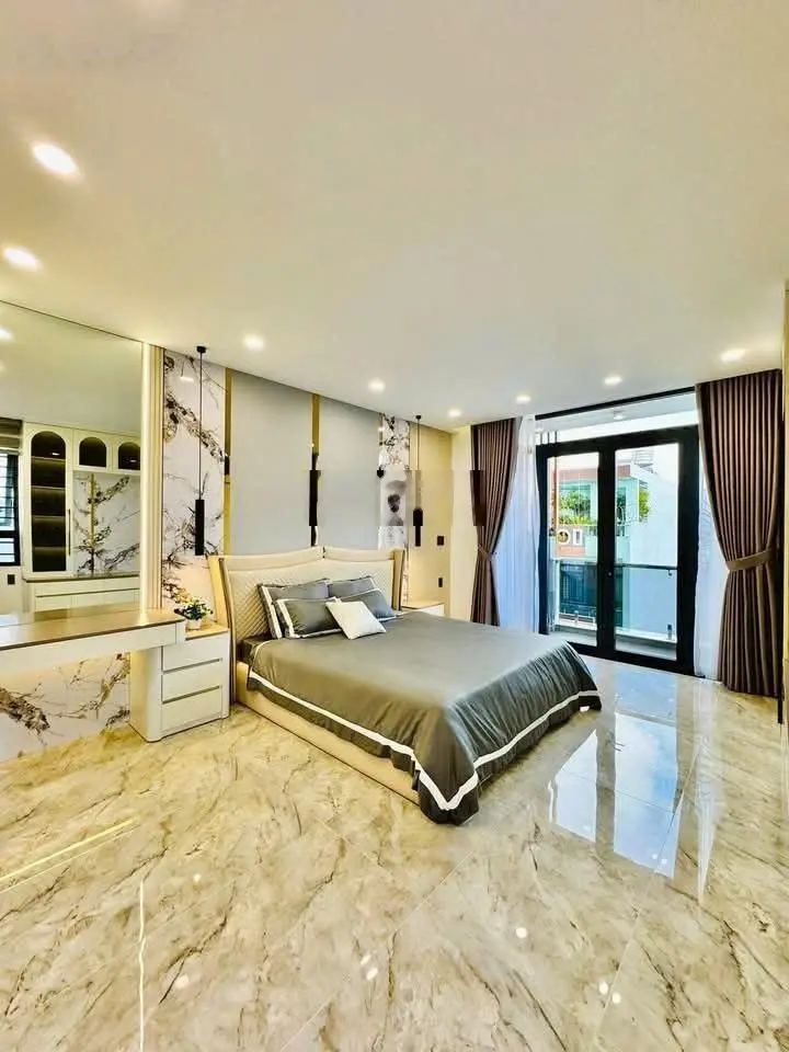 4,2x20m. 6tầng. Thang máy. FULL nội thất cao cấp. Mặt tiền hẻm 8m thông Lê Văn Thọ. 17tỷ TL.